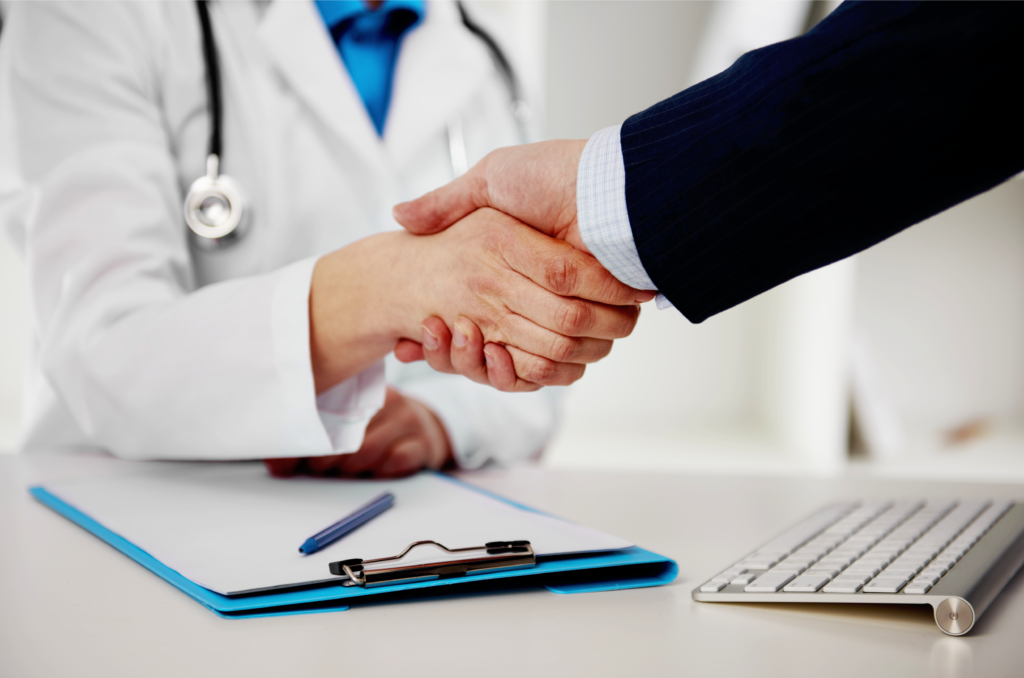 Female Doctor shaking mans hand If you need help getting a prescription that's not covered by your plan, work with your doctor to get the coverage you need.
